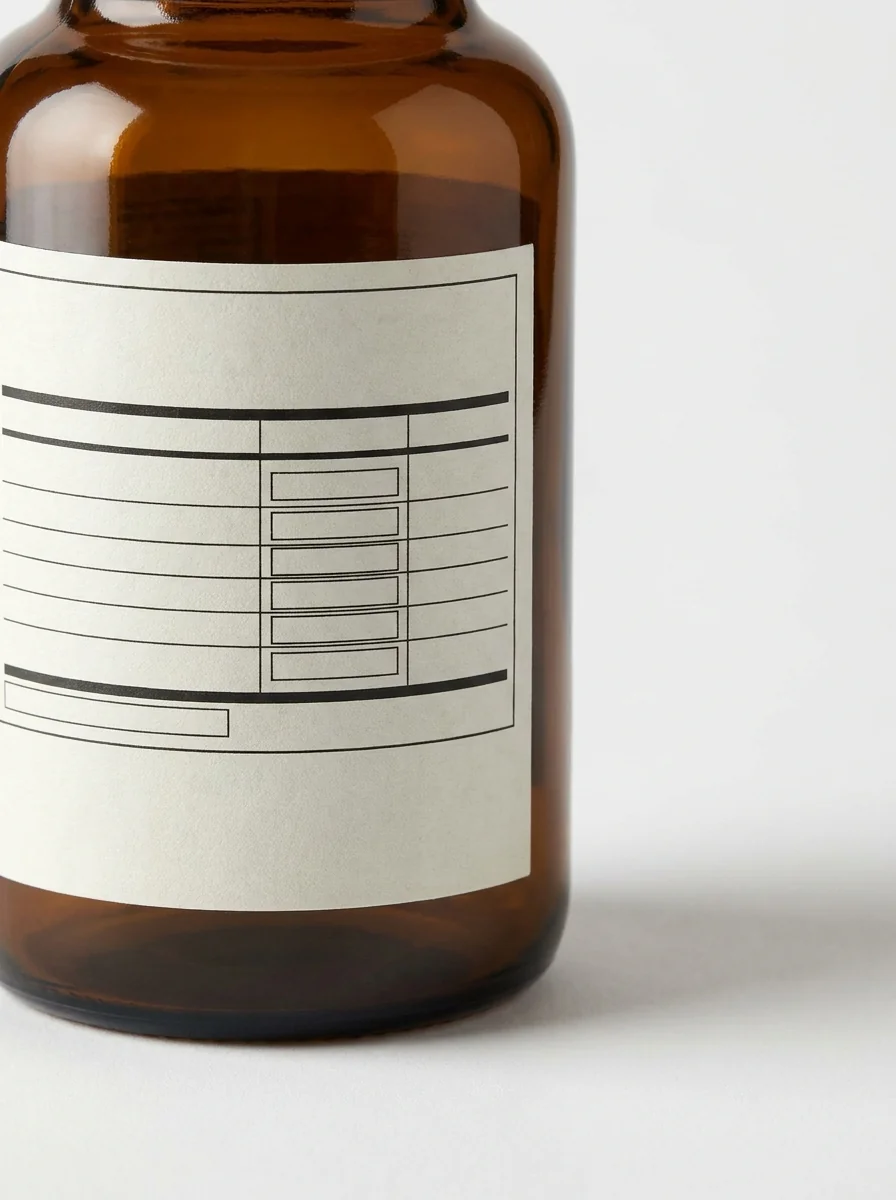 Vitamin supplement bottle with a custom compliance-ready label